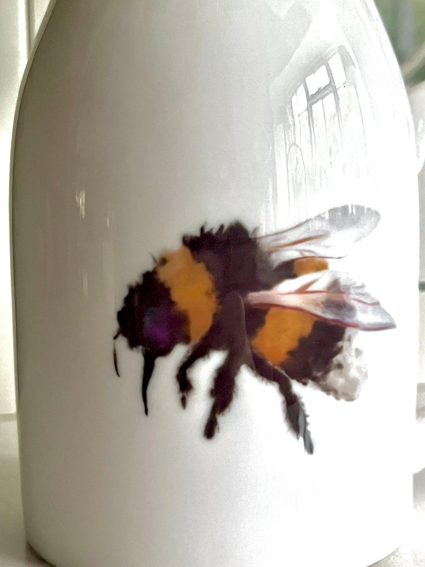 White ceramic milk jug vase with Bumble Bee by Lucy Melrose