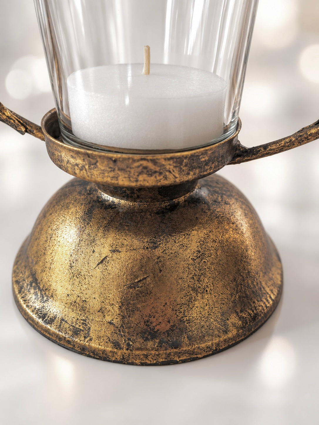 Aged brass effect laurel leaf candle holder