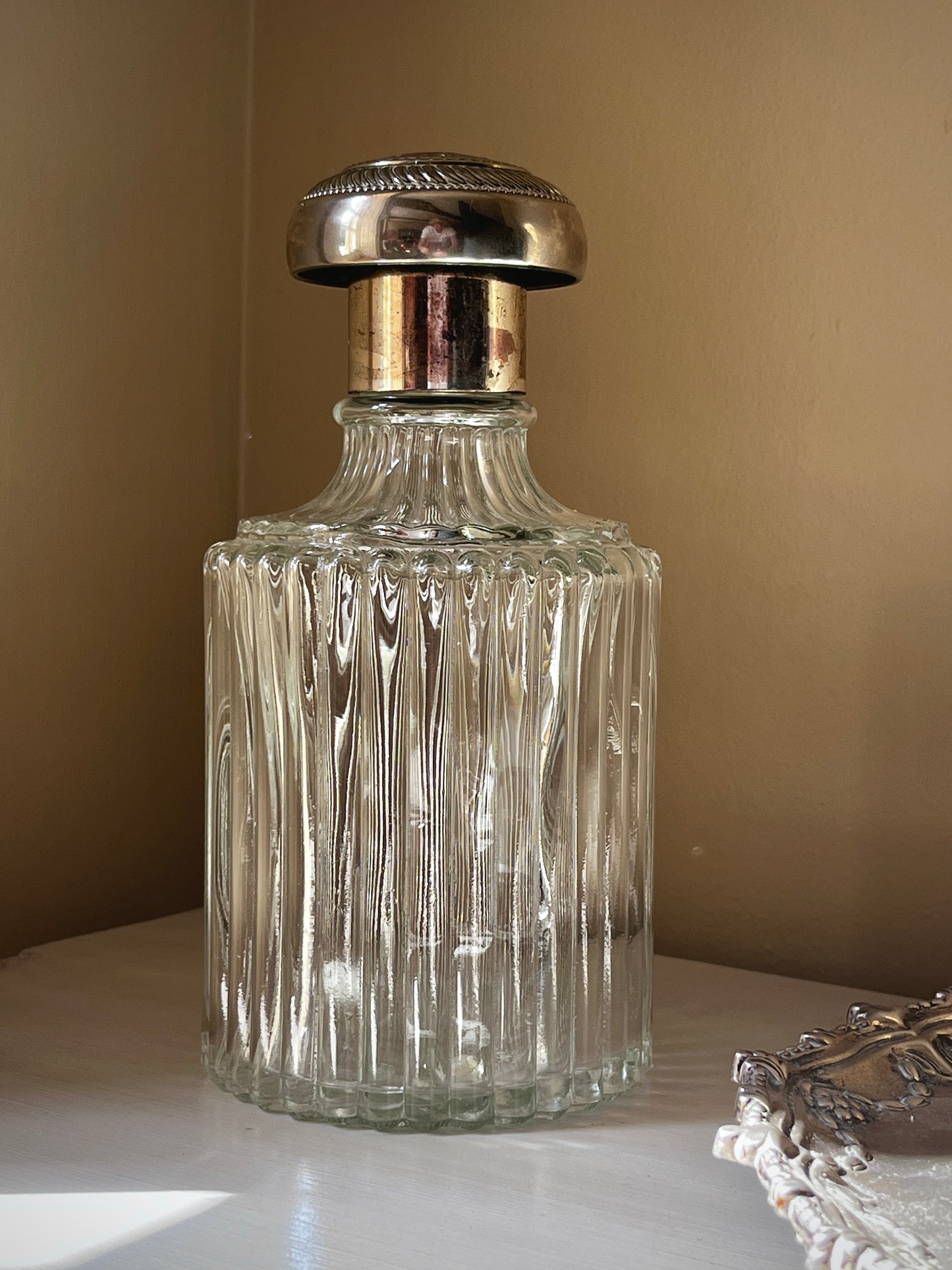 A stunning vintage cut glass decanter with ornate silver plated stopper RESERVED