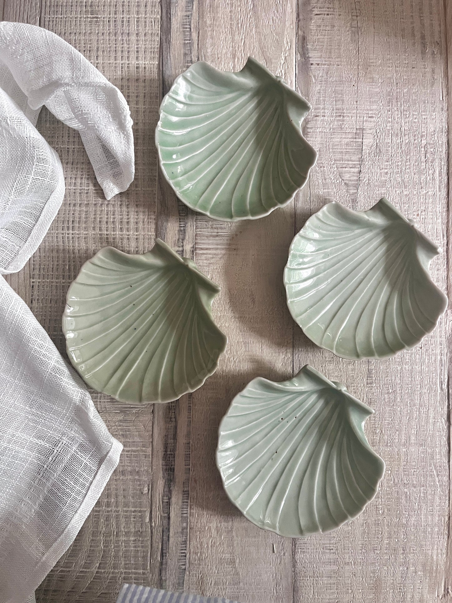 Set of 4 Vintage Japanese Celadon Glazed Scallop Shell Dishes, circa 1970s.