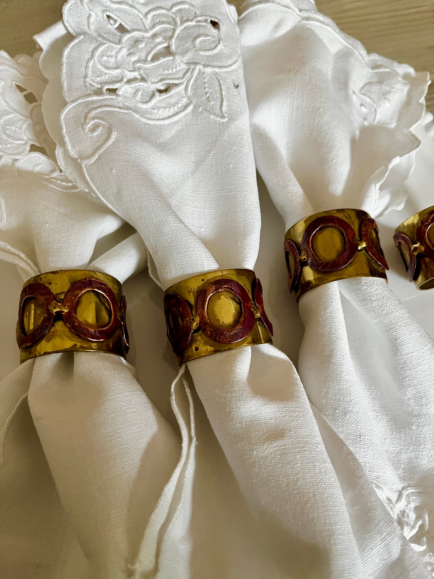 Set of 4 Hand forged Gold Metal Napkin Rings with Red Detail