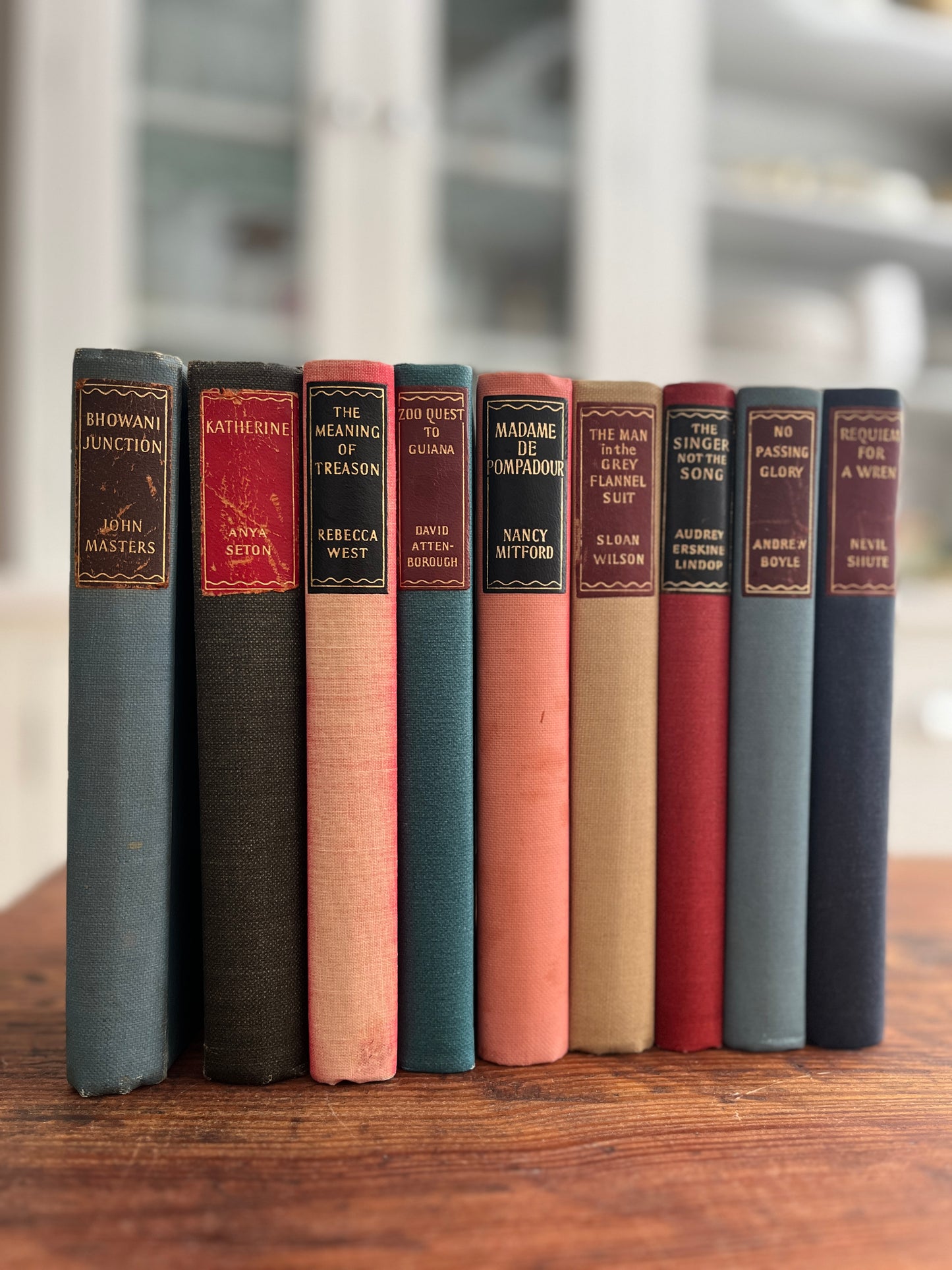 Collection of 9 Hardback books with Coloured backs. Various Titles