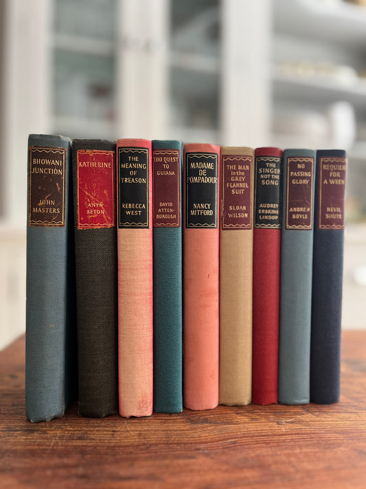 Collection of 9 Hardback books with Coloured backs. Various Titles