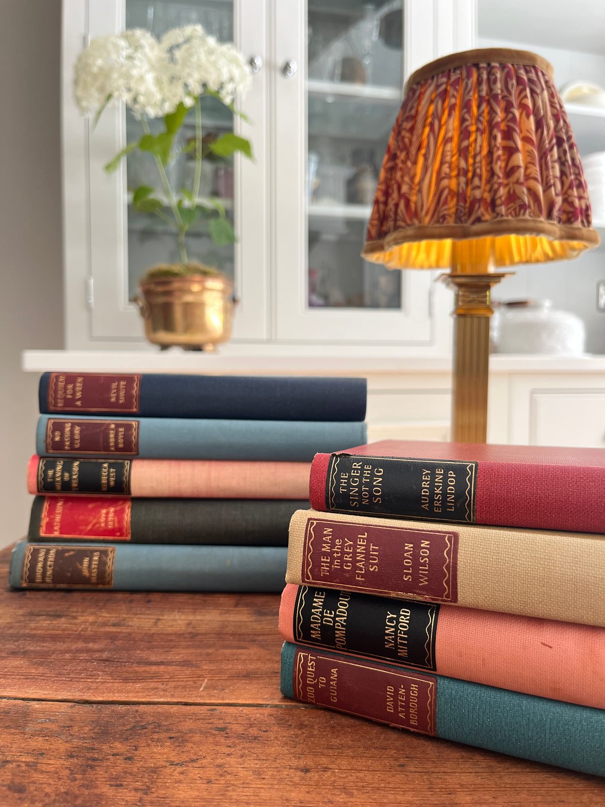 Collection of 9 Hardback books with Coloured backs. Various Titles