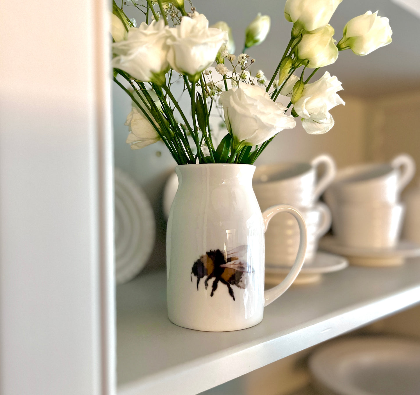 White ceramic milk jug vase with Bumble Bee by Lucy Melrose