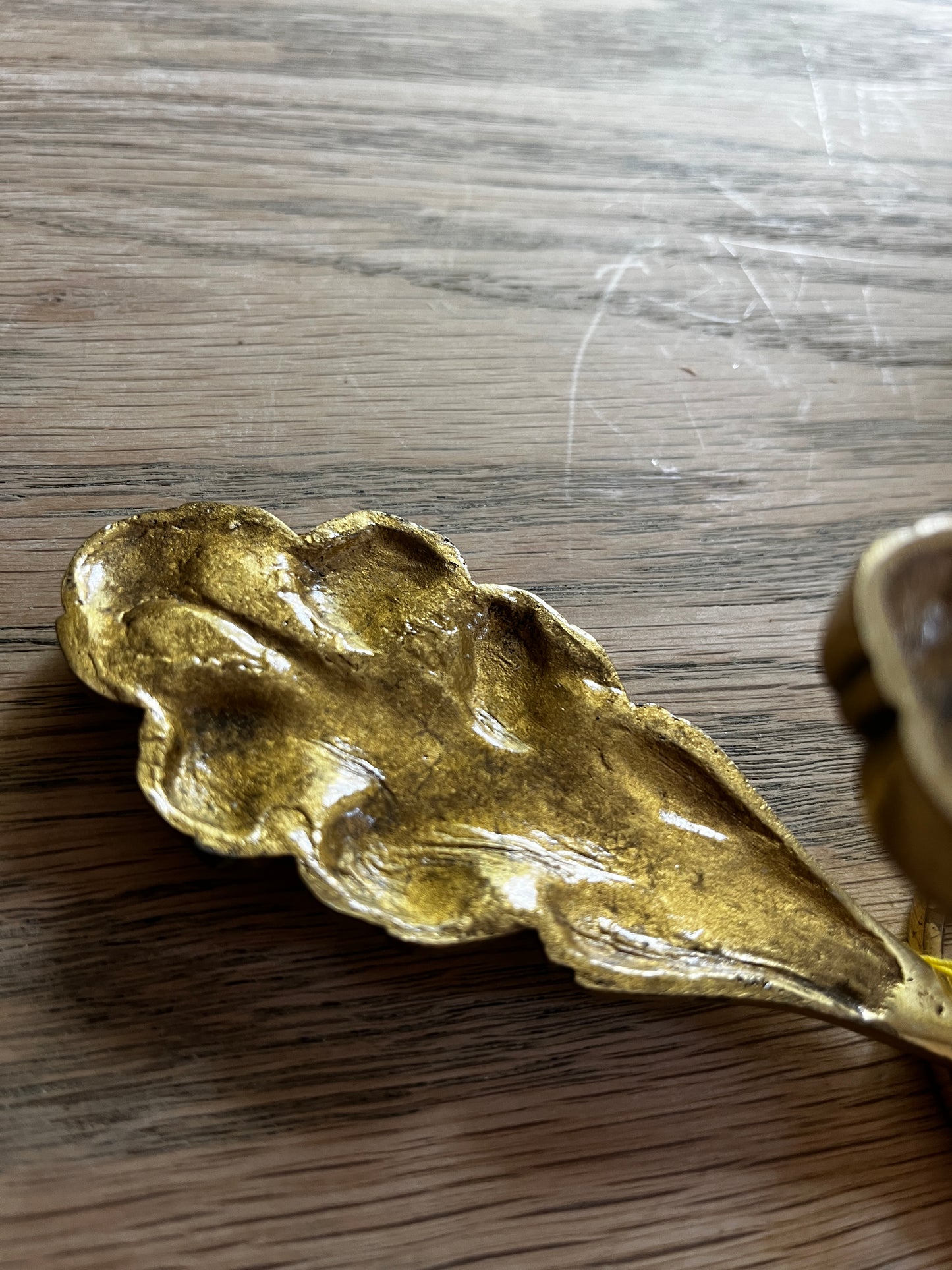 A Pair of Antique Heavy Brass Tie Backs