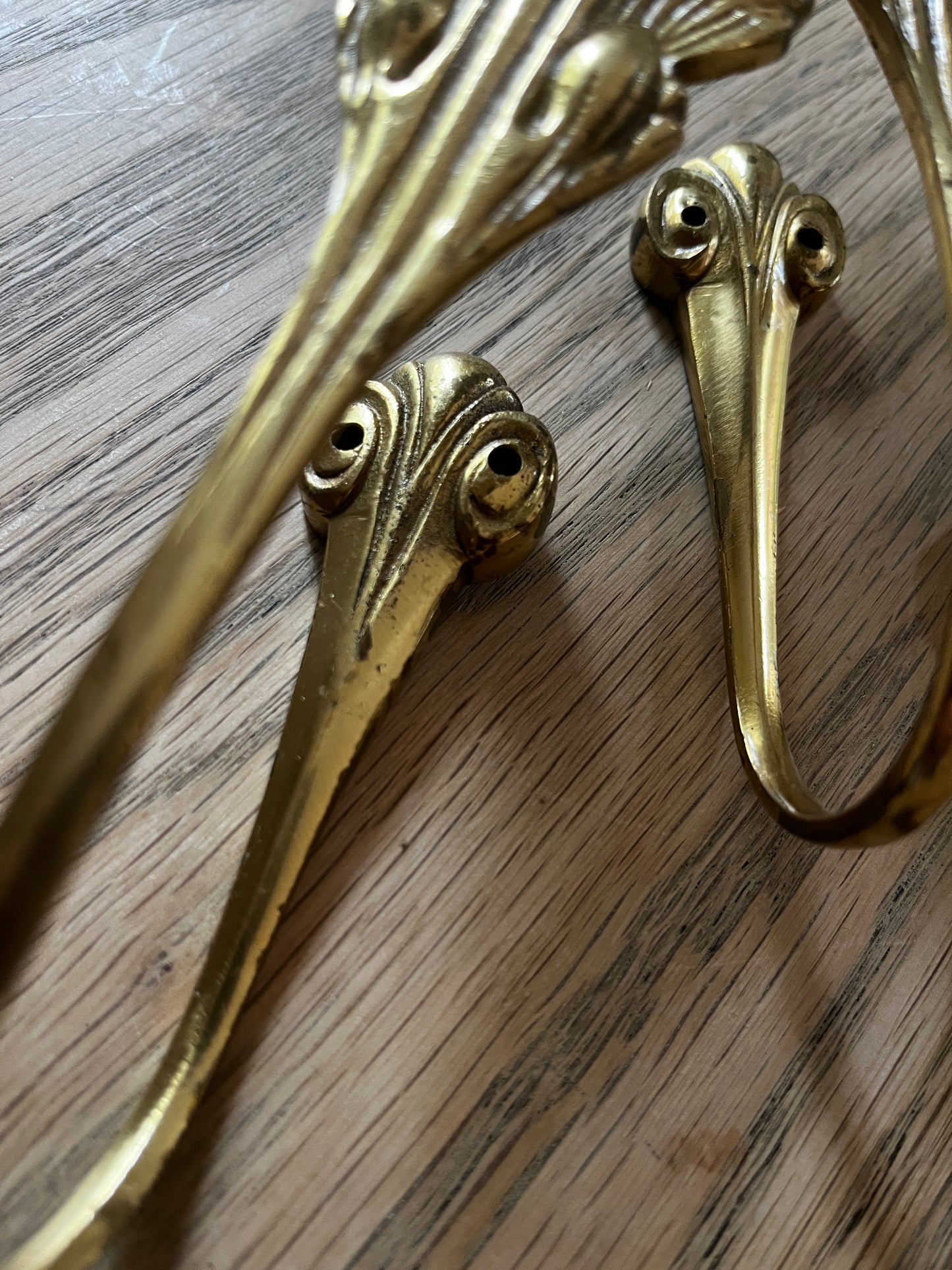 A Pair of Antique Heavy Brass Tie Backs
