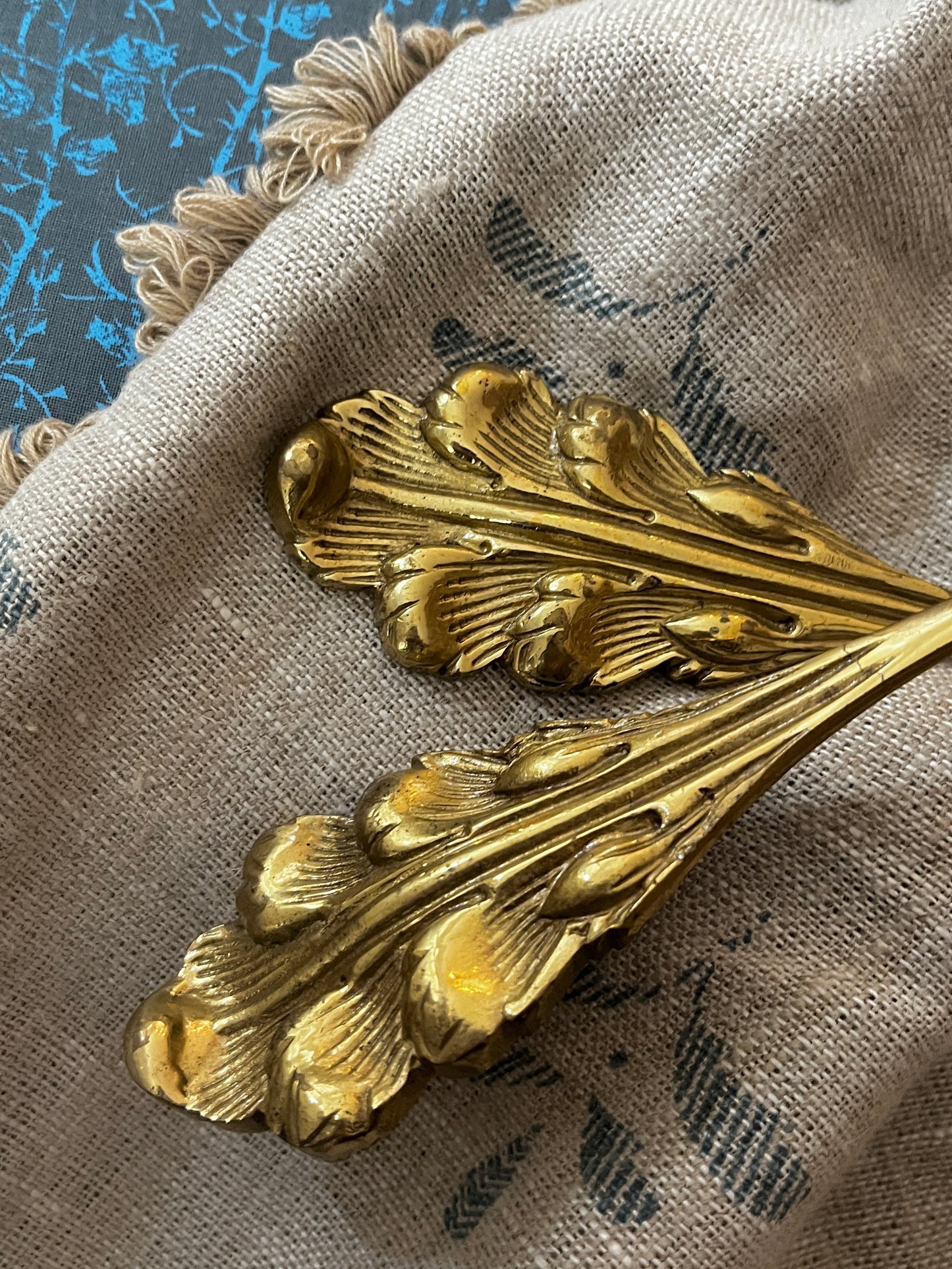 A Pair of Antique Heavy Brass Tie Backs